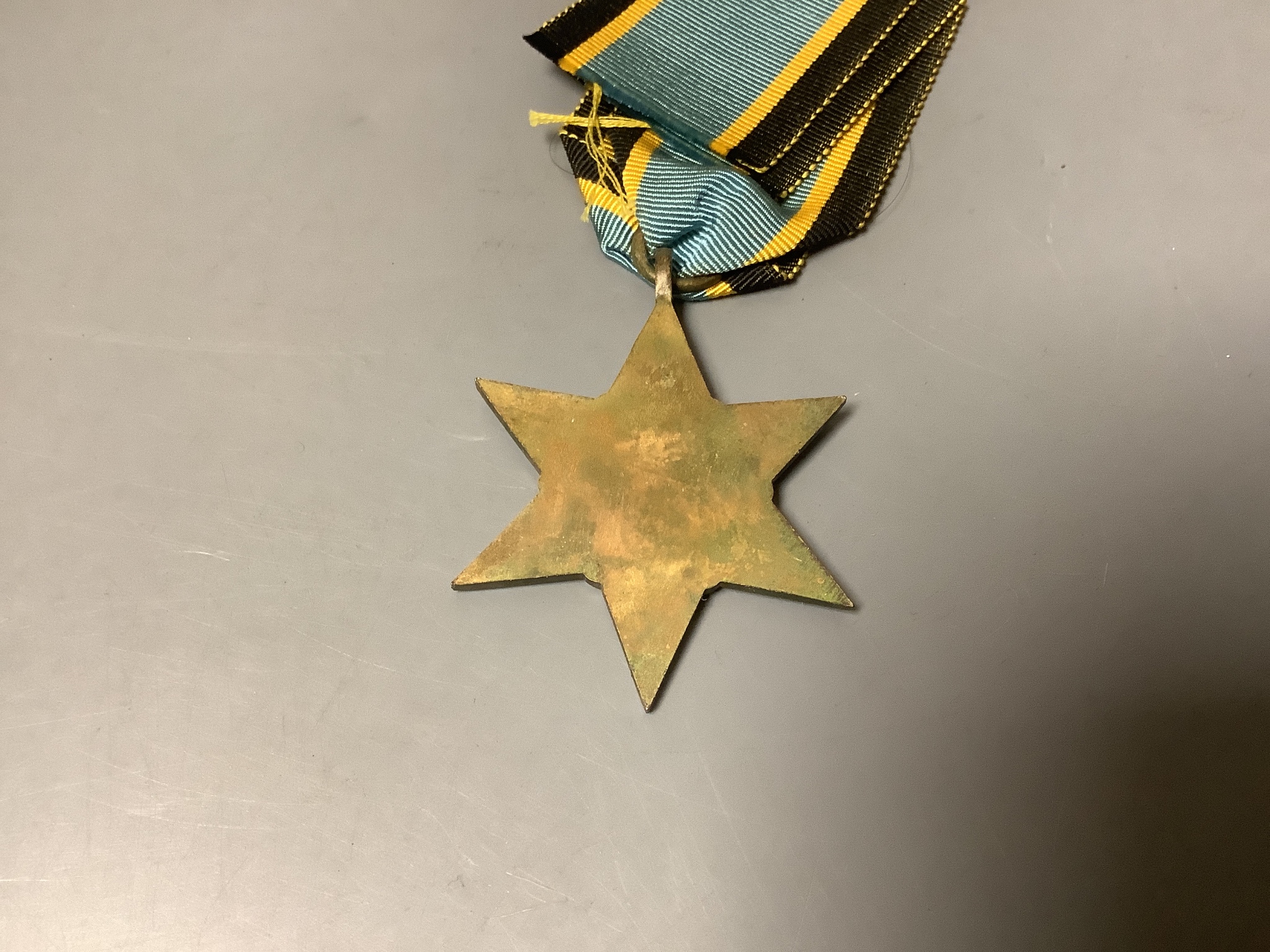 Fifteen unnamed WW2 medals to include Aircrew Europe star, 1939-1945 star (two), the Africa star, the Pacific, the Burma star, The Italy star (two), the Defence medal (two), France and Germany star, Canadian silver Defen